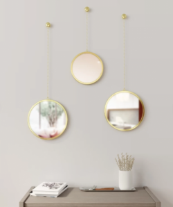 Rundt messing spejl fra Umbra